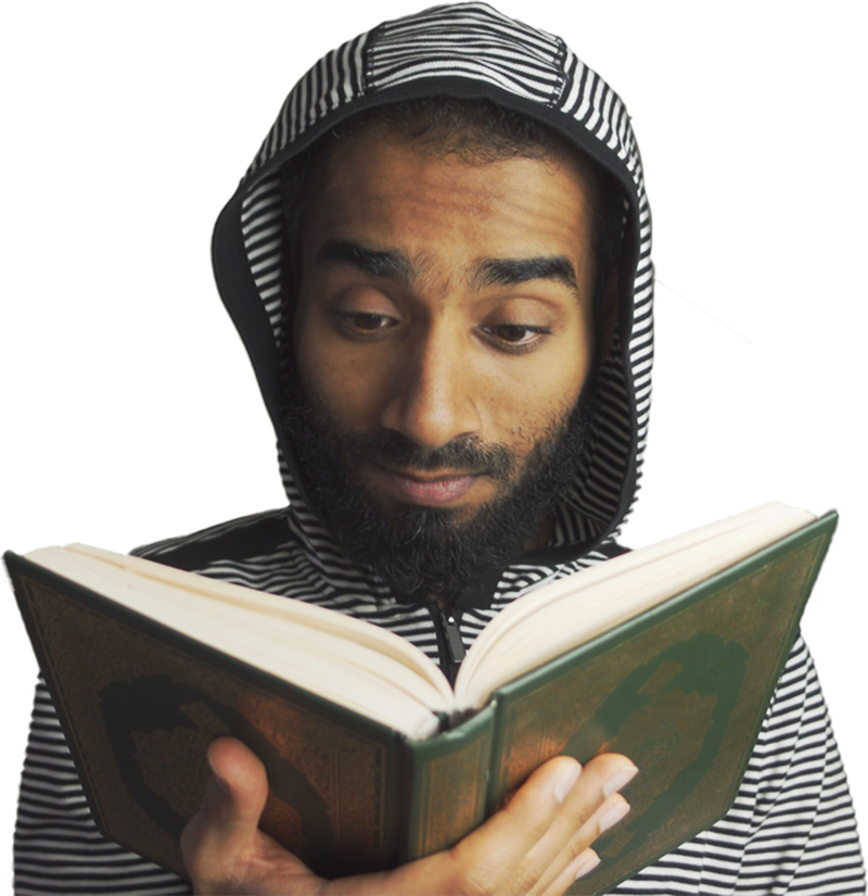 Mohammed Hamed, in a striped hoodie, reading from a mushaf